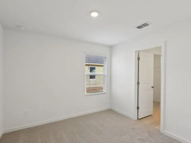 Spacious, unfurnished interior of a new home in Flagler Village - Signature Series, Palm Coast (Image 10).