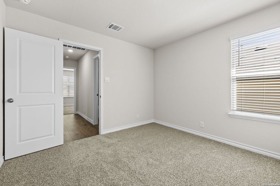 Spacious, unfurnished interior of a new home in Redbird Ranch, San Antonio (Image 12).