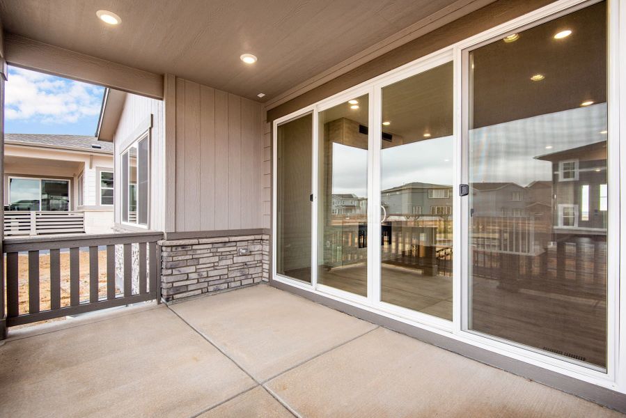 Exterior details and patio area of a home in The Aurora Highlands, Aurora (Image 21). Exterior details and patio area of a home in The Aurora Highlands, Aurora (Image 21).