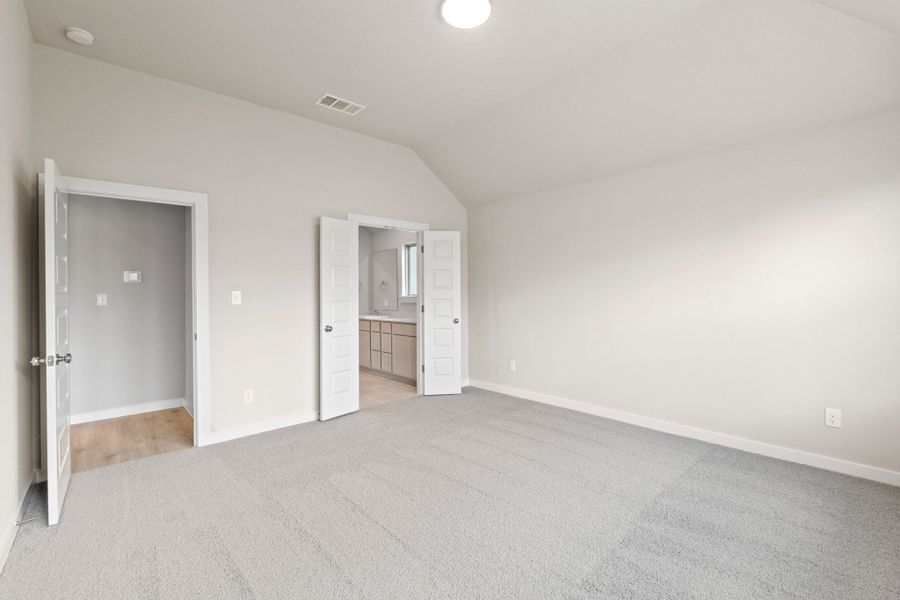 Representative unfurnished interior of a home built from the Nueces by Trophy Signature Homes in Prairie Winds, Hutto (Image 23).