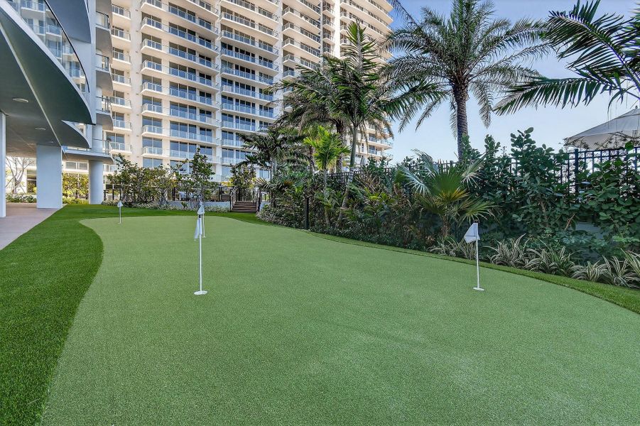 Putting green by lower pool