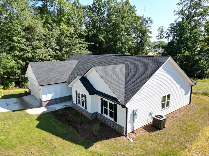 Front exterior of a new home in , Temple, GA, highlighting curb appeal (Image 14). Front exterior of a new home in , Temple, GA, highlighting curb appeal (Image 14).