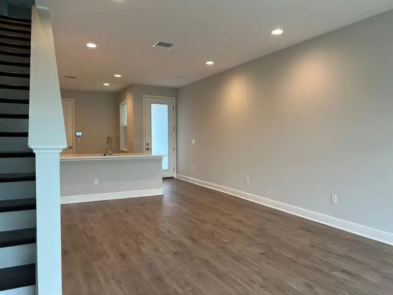 Spacious, unfurnished interior of a new home in The Towns At Long Bayou, Seminole (Image 14).