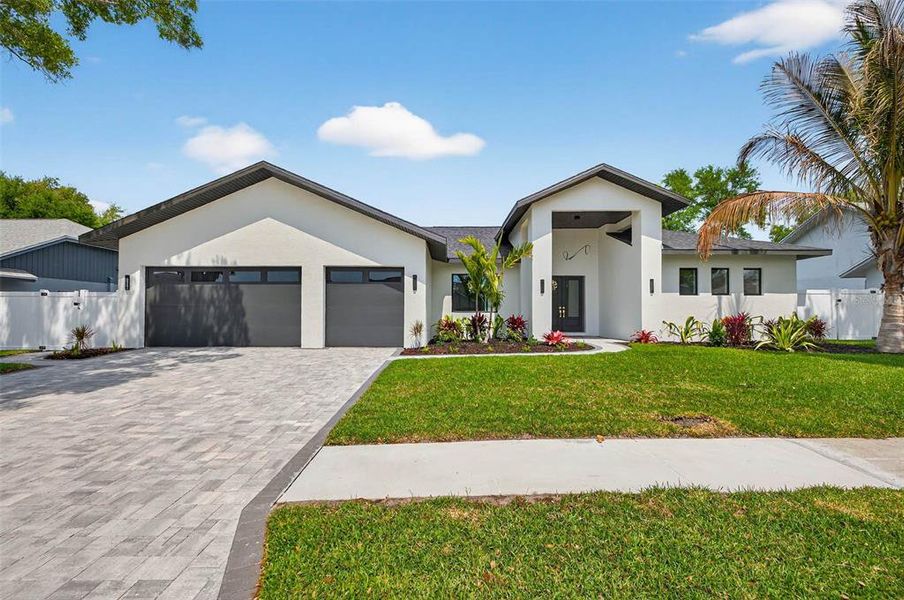 Front exterior of a new home in , Largo, FL, highlighting curb appeal (Image 30). Front exterior of a new home in , Largo, FL, highlighting curb appeal (Image 30).