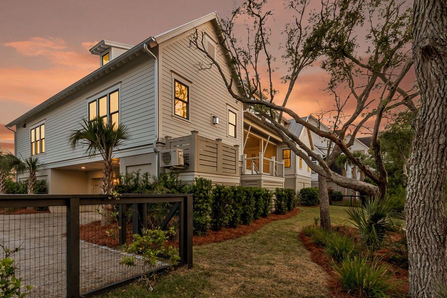 Exterior details and patio area of a home in Daniel Island Park, Charleston (Image 34).
