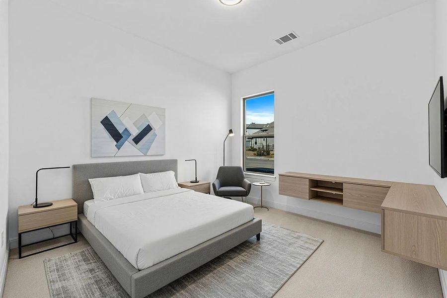 Furnished interior view inside a new home in Parmer Ranch 60, Georgetown (Image 8).