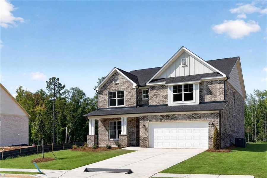 Front exterior of a new home in , Loganville, GA, highlighting curb appeal (Image 30).
