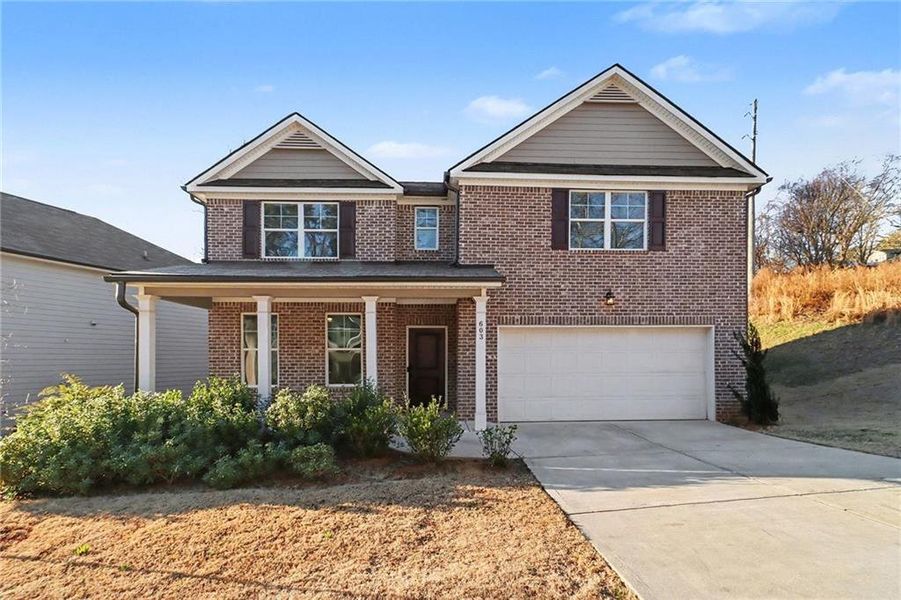 Front exterior of a new home in , Atlanta, GA, highlighting curb appeal (Image 27).