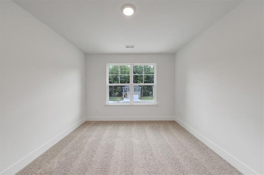 Spacious, unfurnished interior of a new home in Canterbury Villas, Carrollton (Image 32).