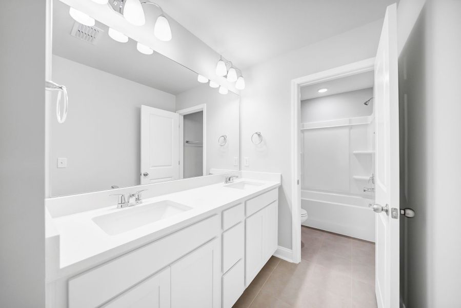 Furnished interior view inside a new home in Monroe Preserve, Chapin (Image 4).