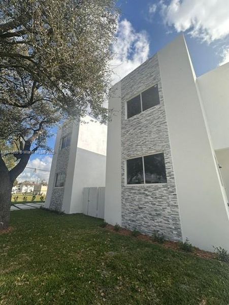 Front exterior of a new home in , Fort Lauderdale, FL, highlighting curb appeal (Image 2).