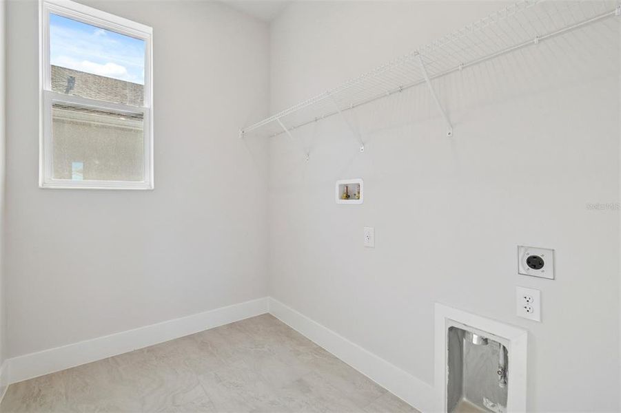 Spacious, unfurnished interior of a new home in Waterset Tradition Series, Apollo Beach (Image 30).