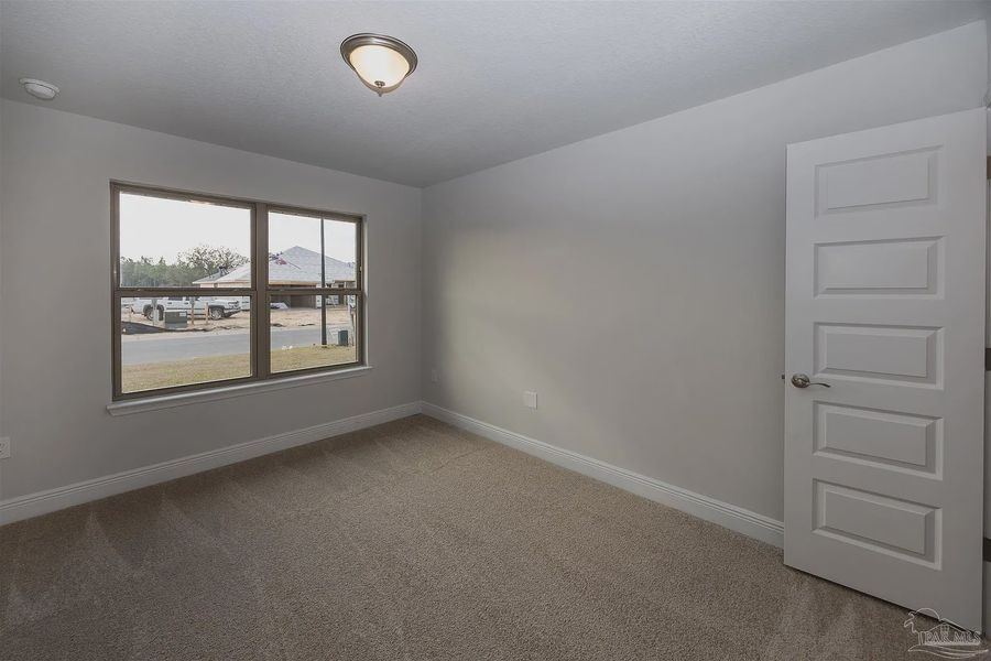 Spacious, unfurnished interior of a new home in Emmaline Gardens, Milton (Image 22).