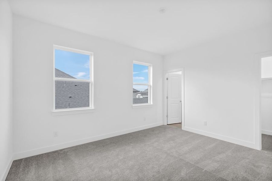 Spacious, unfurnished interior of a new home in Avalon at Friendswood 70s, Friendswood (Image 33).
