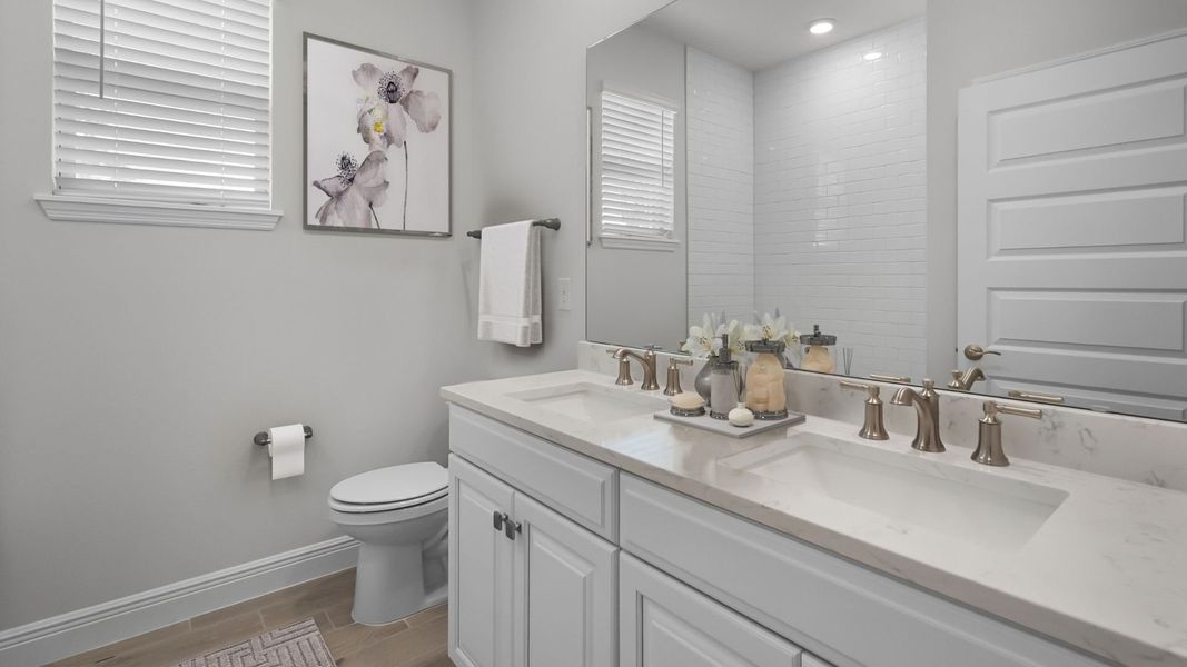 Representative furnished interior of a home built from the BELLMORE by D.R. Horton in Waterleigh, Winter Garden (Image 11).