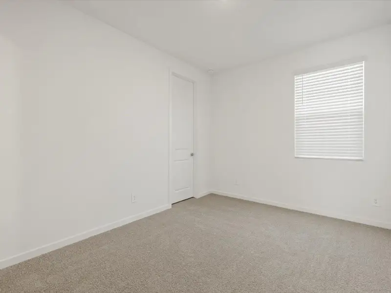Spacious, unfurnished interior of a new home in Mesquite Mountain Ranch at Frontera, Surprise (Image 11).