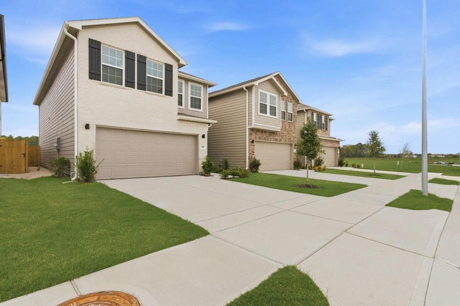 Front exterior of a new home in , Houston, TX, highlighting curb appeal (Image 25). Front exterior of a new home in , Houston, TX, highlighting curb appeal (Image 25).