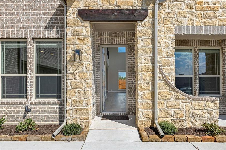 Exterior details and patio area of a home in The Grove, Midlothian (Image 2).