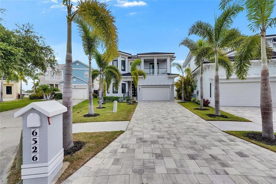 Front exterior of a new home in , Apollo Beach, FL, highlighting curb appeal (Image 32).