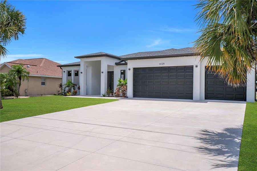 Front exterior of a new home in , Port Charlotte, FL, highlighting curb appeal (Image 25). Front exterior of a new home in , Port Charlotte, FL, highlighting curb appeal (Image 25).