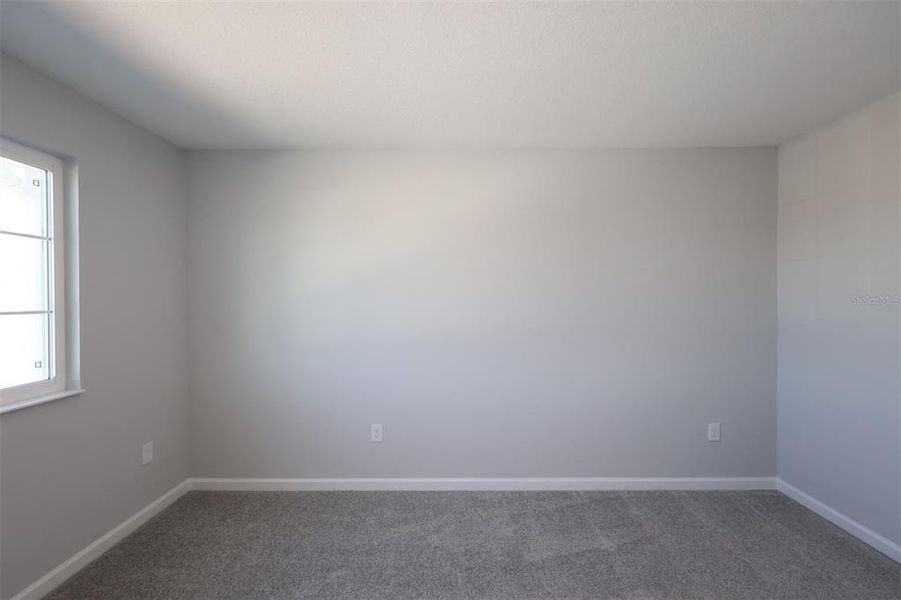 Spacious, unfurnished interior of a new home in Tyson Ranch, Orlando (Image 18).