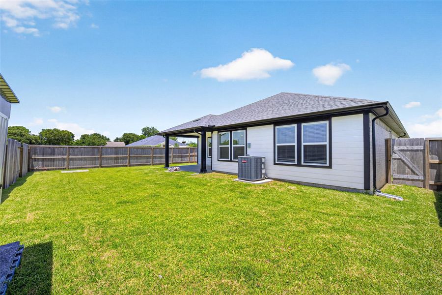 Exterior details and patio area of a home in , Texas City (Image 29).