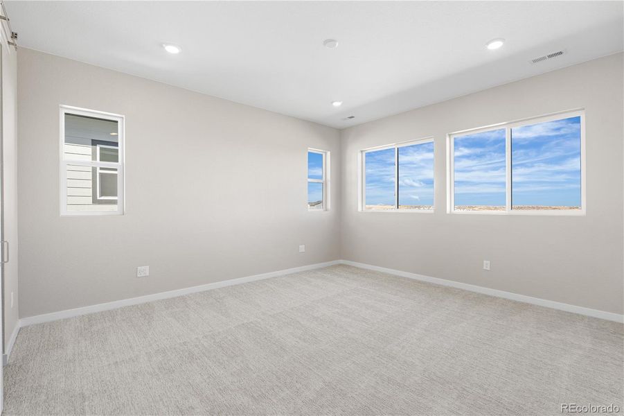 Spacious, unfurnished interior of a new home in Portrait at The Canyons, Castle Pines (Image 32).
