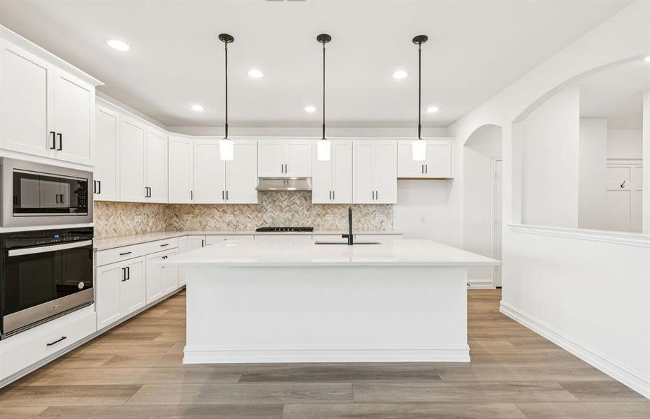 Gourmet kitchen designed for culinary excellence and entertaining  *Real home pictured