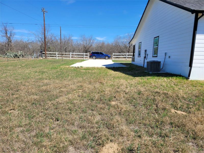 A fresh white siding house, with a neatly maintained lawn, awaits its new owners. A fresh white siding house, with a neatly maintained lawn, awaits its new owners.