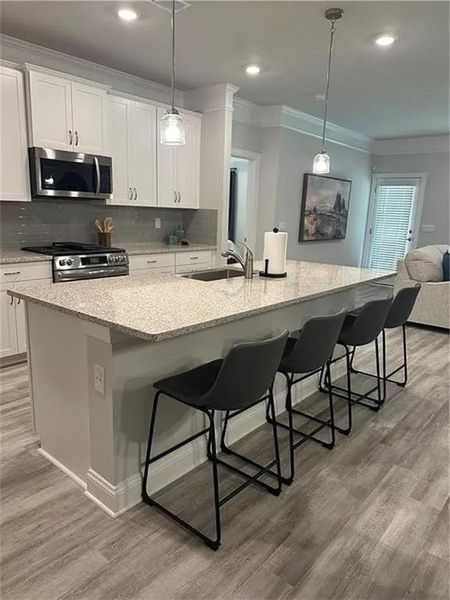 Furnished interior view inside a new home in Mirror Lake at South Harbour, Villa Rica (Image 4).