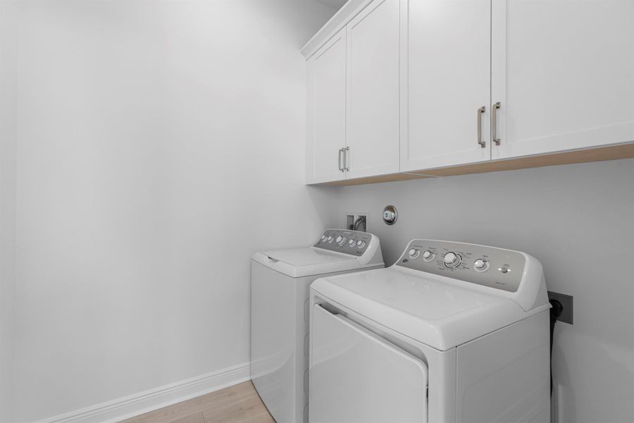 Furnished interior view inside a new home in PGA Village Verano, Port St. Lucie (Image 14).