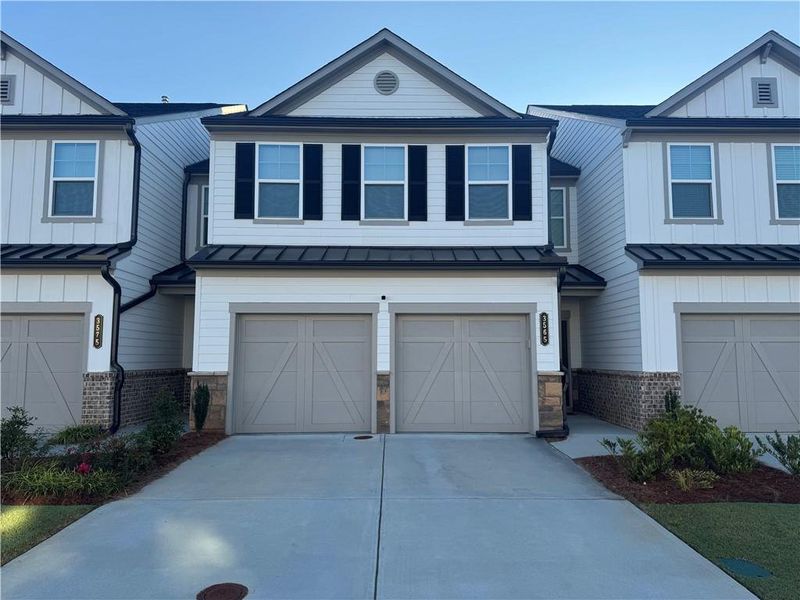 Front exterior of a new home in , Duluth, GA, highlighting curb appeal (Image 2). Front exterior of a new home in , Duluth, GA, highlighting curb appeal (Image 2).
