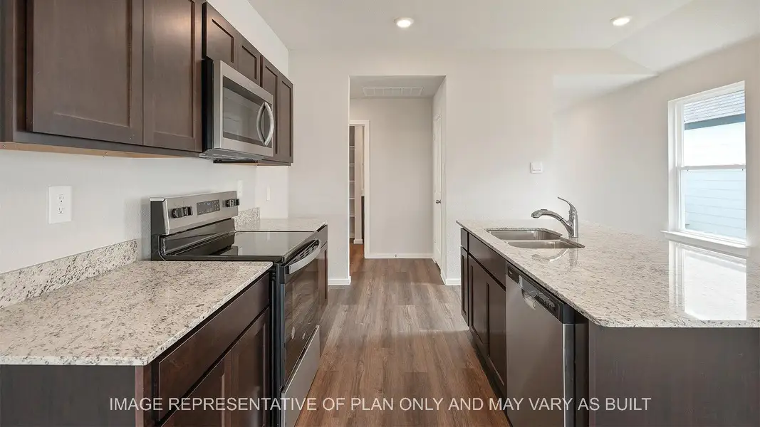 Furnished interior view inside a new home in Midtown Reserve, College Station (Image 6).