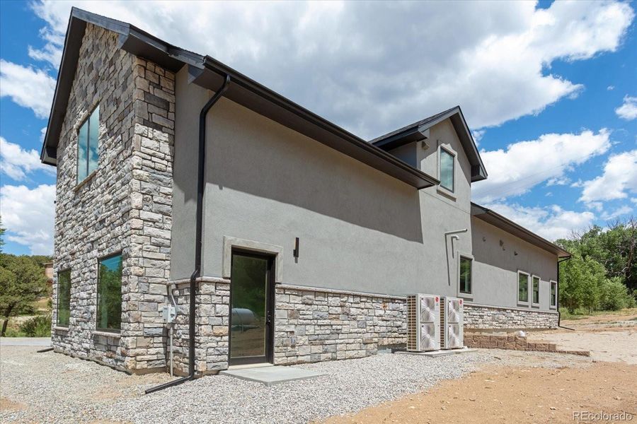 Front exterior of a new home in , Salida, CO, highlighting curb appeal (Image 26).