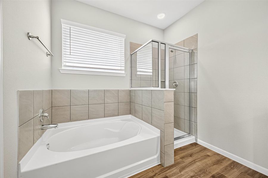 Furnished interior view inside a new home in Sunterra, Katy (Image 15).