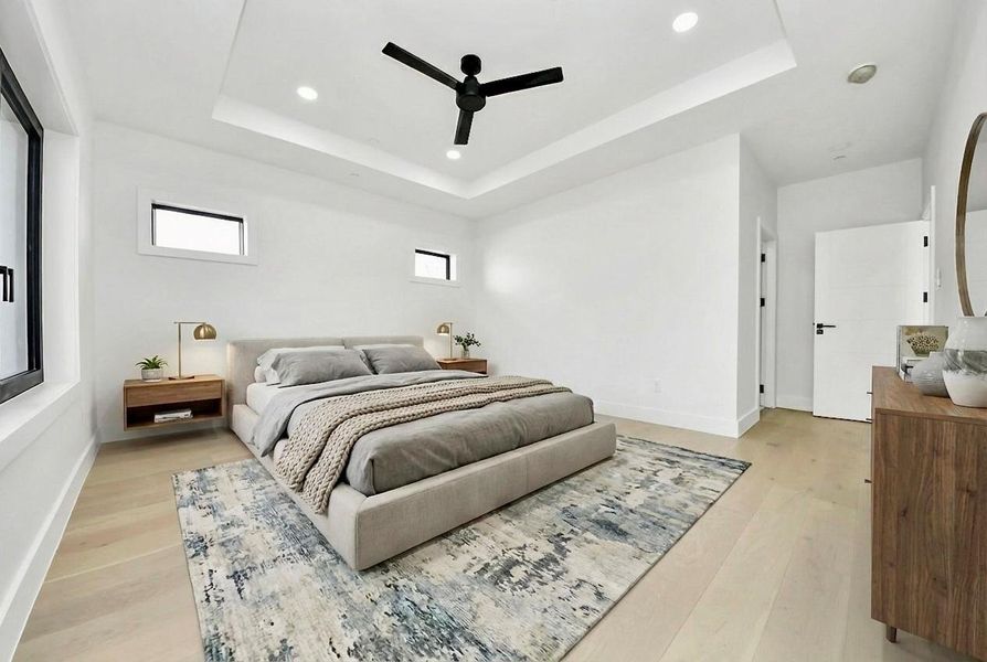 The secondary bedroom is generously proportioned, providing ample space to comfortably accommodate a king-sized bed.