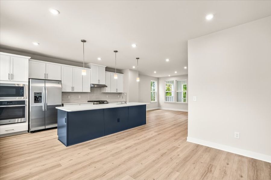 Furnished interior view inside a new home in Townes at The Station, Apex (Image 6).