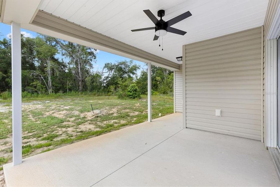Exterior details and patio area of a home in , Bushnell (Image 24).