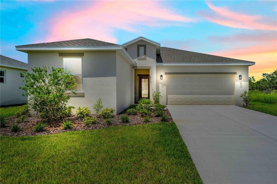 Front exterior of a new home in , Weeki Wachee, FL, highlighting curb appeal (Image 28).