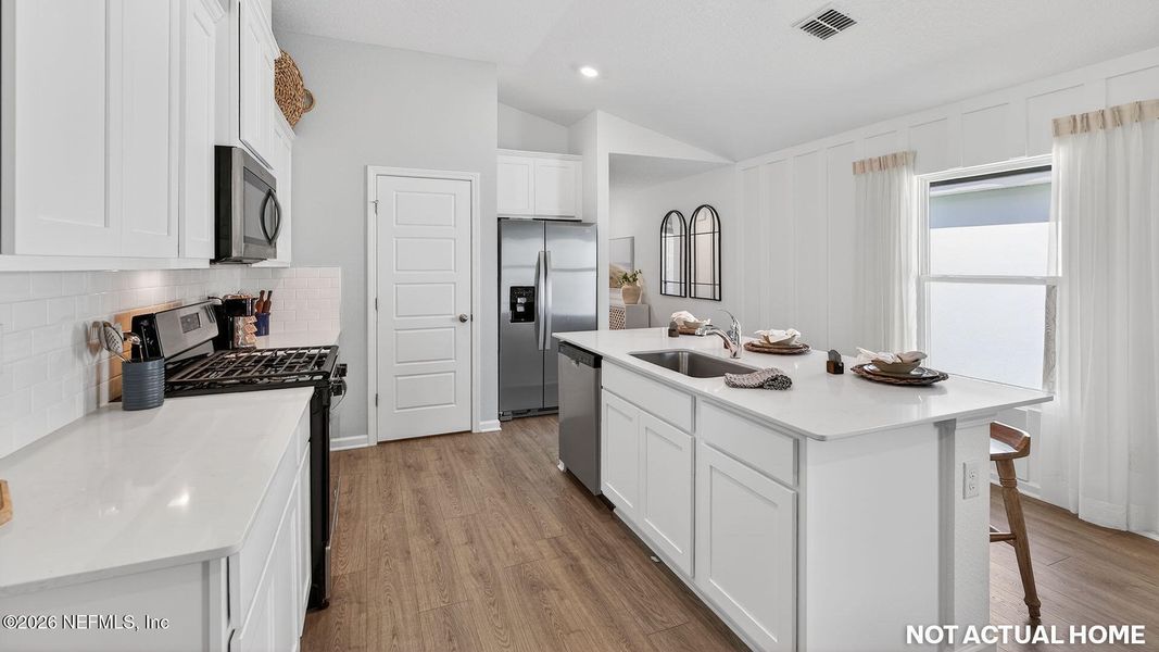 Furnished interior view inside a new home in Grand Reserve, Bunnell (Image 7).