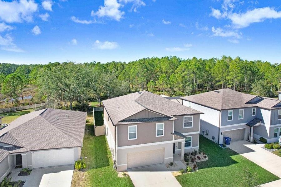 Front exterior of a new home in , Zephyrhills, FL, highlighting curb appeal (Image 27). Front exterior of a new home in , Zephyrhills, FL, highlighting curb appeal (Image 27).