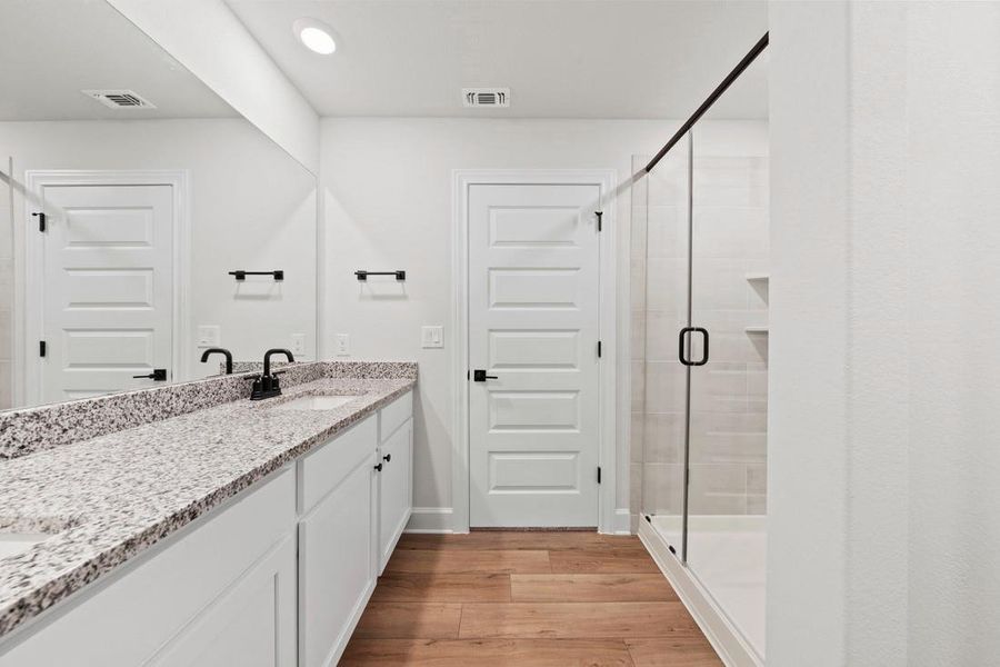 Furnished interior view inside a new home in Whisper Valley, Manor (Image 9).