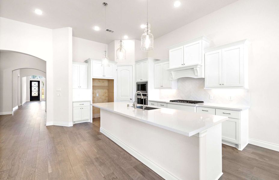 Representative furnished interior of a home built from the 2464 by Ravenna Homes in The Highlands 55′, Porter (Image 6). Representative furnished interior of a home built from the 2464 by Ravenna Homes in The Highlands 55′, Porter (Image 6).