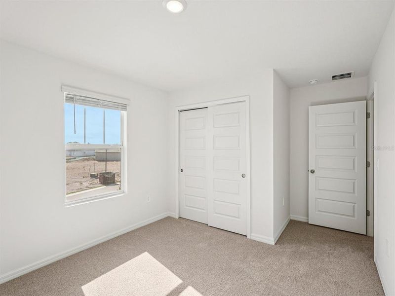 Spacious, unfurnished interior of a new home in Coasterra - Premier Series, Palmetto (Image 11).