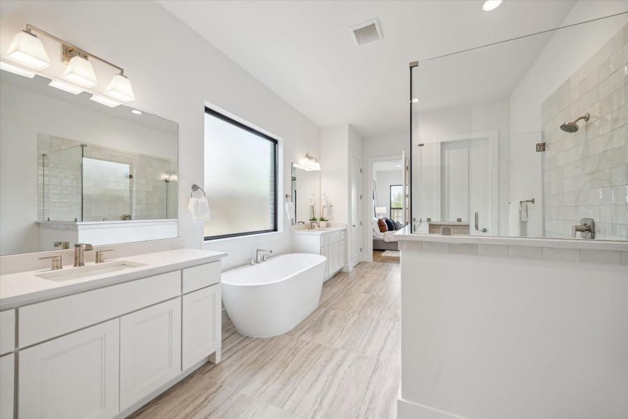 Primary Bath has separate vanities, deep soaking bathtub, walk-in shower, and 2 closets! Primary Bath has separate vanities, deep soaking bathtub, walk-in shower, and 2 closets!