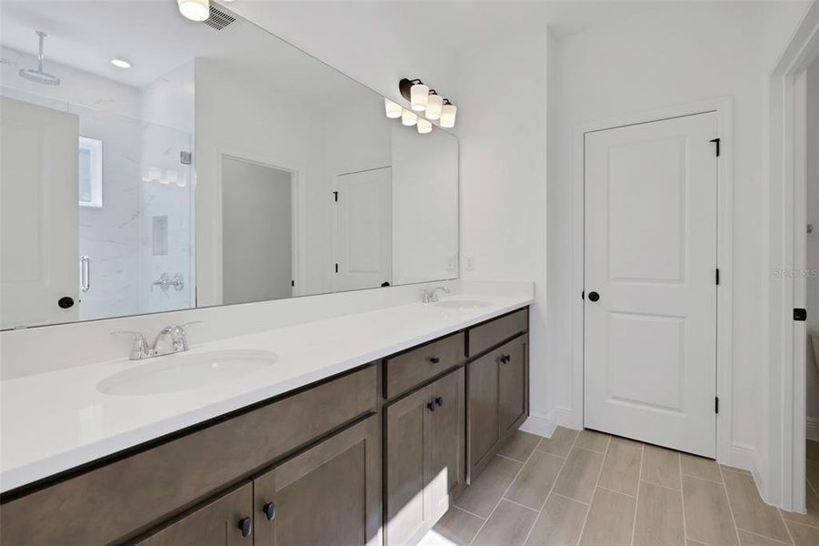 Furnished interior view inside a new home in Serenade at Ovation, Winter Garden (Image 16). Furnished interior view inside a new home in Serenade at Ovation, Winter Garden (Image 16).