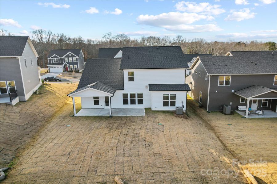 Exterior details and patio area of a home in Forest Creek, Waxhaw (Image 32).