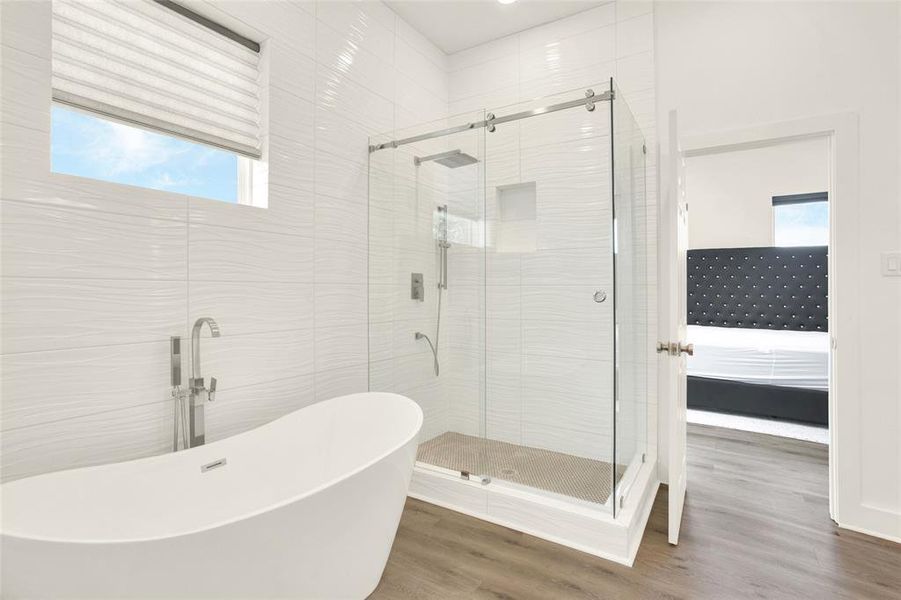 Primary Bathroom Huge Soaking Tub and Shower.