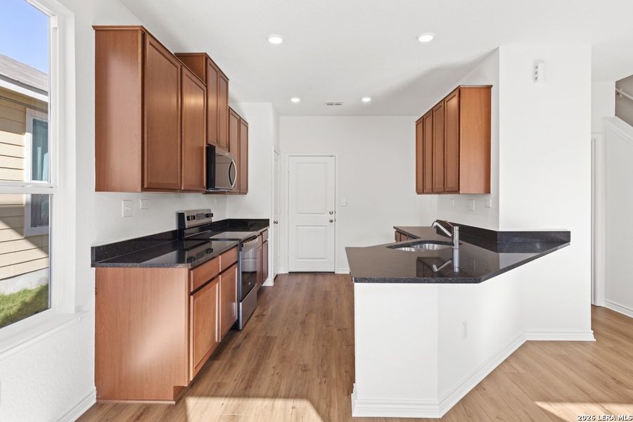 Furnished interior view inside a new home in Spanish Trails Villas, San Antonio (Image 13).