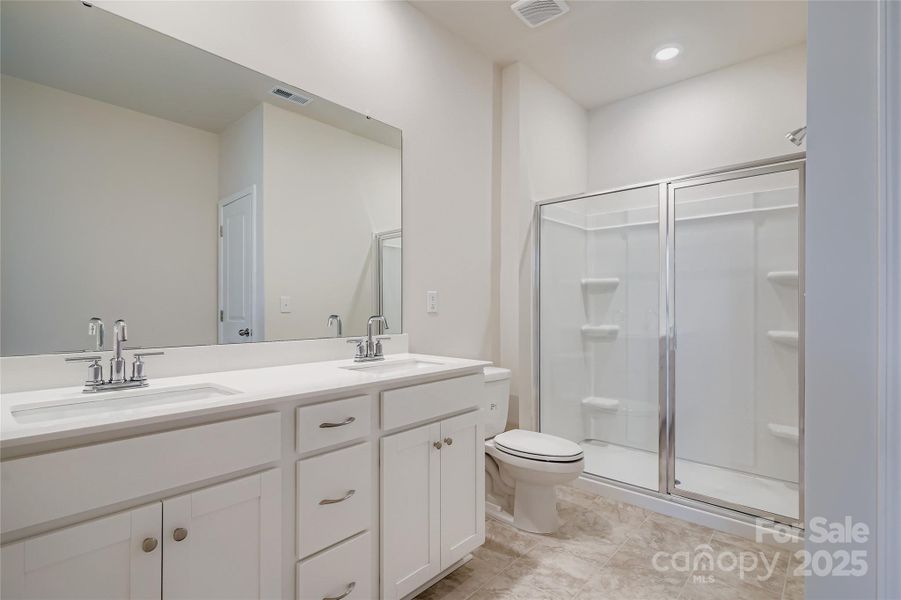 Furnished interior view inside a new home in Shannon Woods: Walk & Enclave, Maiden (Image 6).